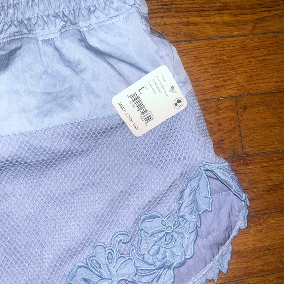 NWT Free People Movement Lace Bottom Mesh Shorts in Lavender Size Large $78 MSRP - Picture 2 of 5